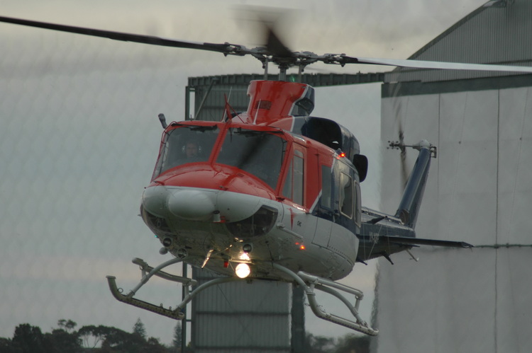 A helicopter a few feet above the ground