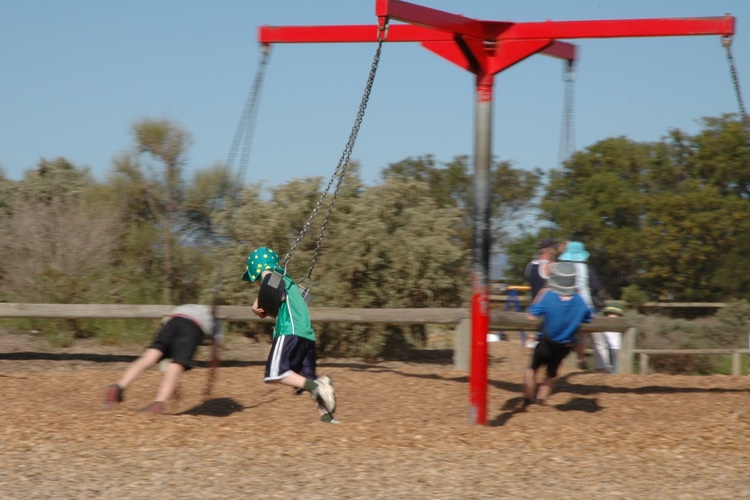 Michael on a rotary swing