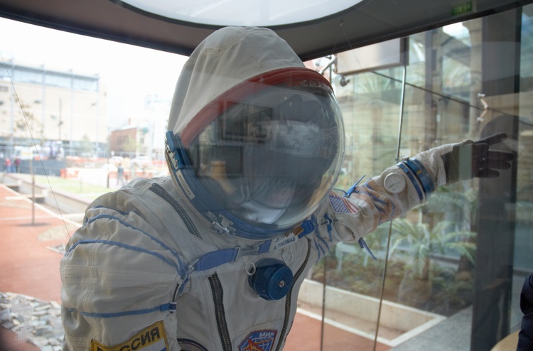 spacesuit in a glass display case