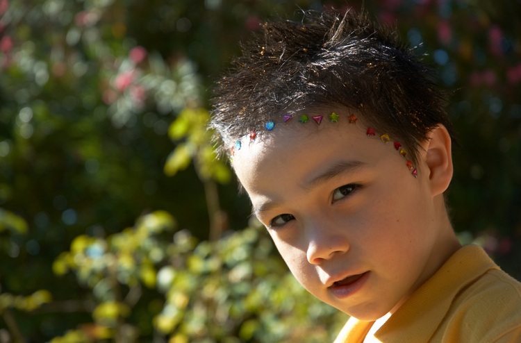 Michael's hair done up with glitter and stickers