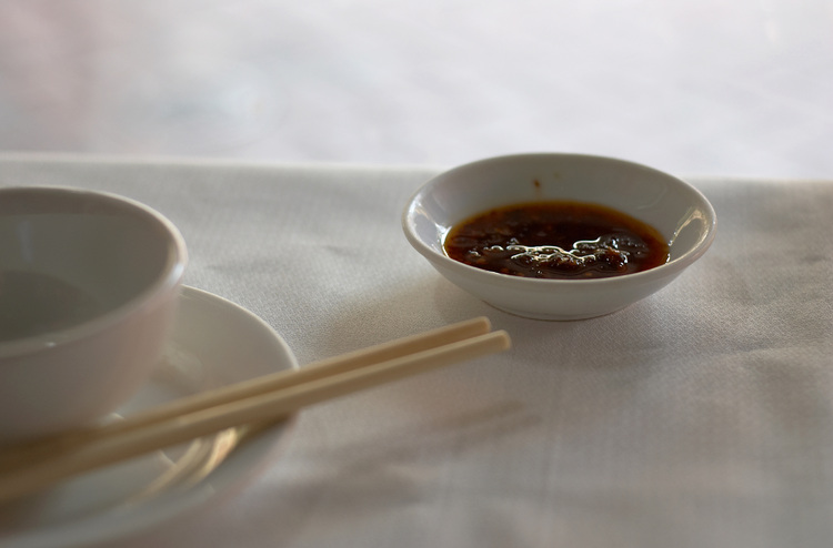 Chopsticks and chilli-sauce