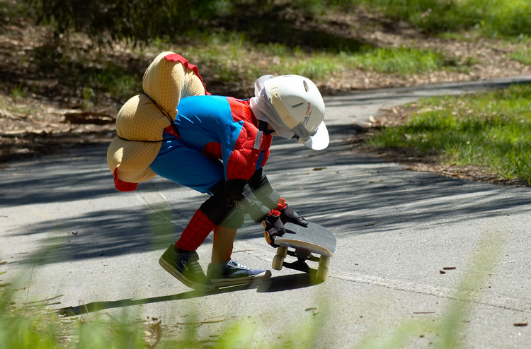 Michael picking up his skateboard