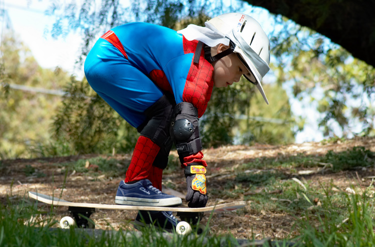 Michael starting off downhill on his skateboard