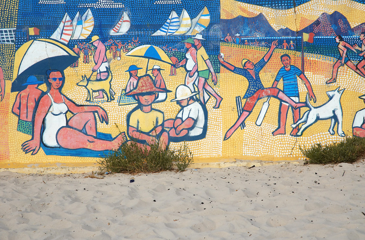A mural of a beach scene
