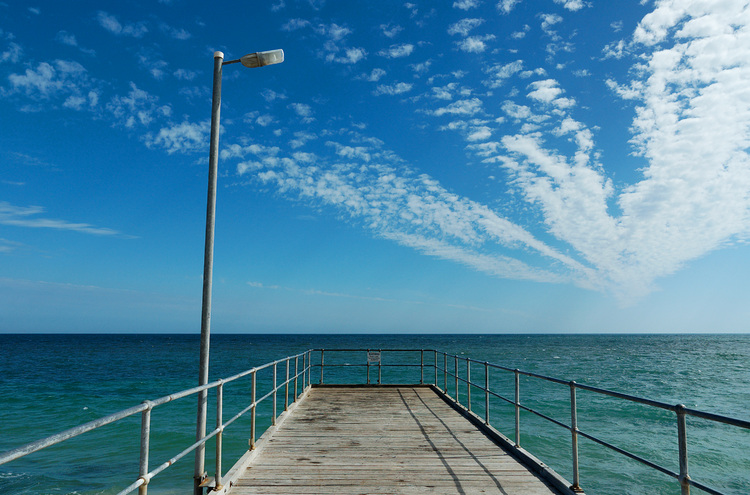 The sea and sky beyond a jetty