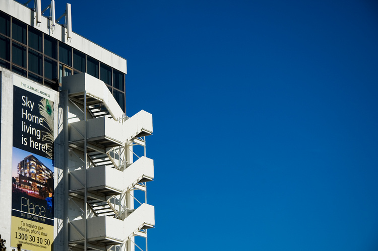 Building edge against blue sky