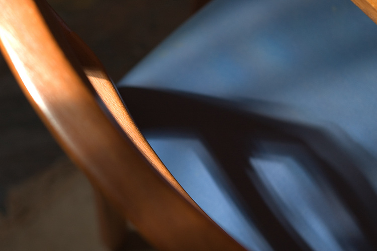 The shadow of a chair-back