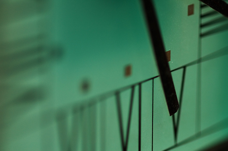 Closeup of the hands and digits of a clock