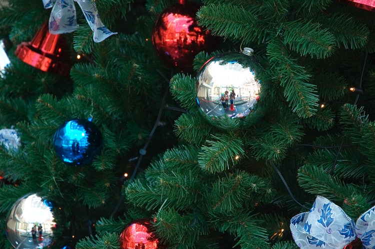 Closeup of Christmas baubles on a tree