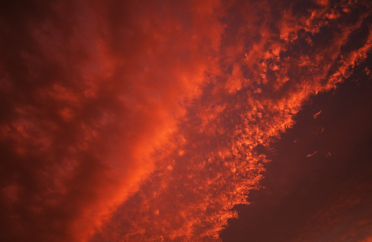 Bright orange, whispy, clouds