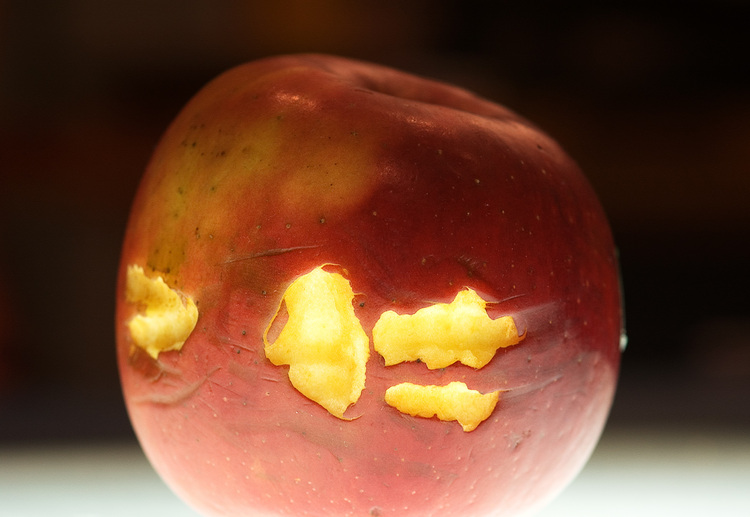 Closeup of an apple with tooth marks on it