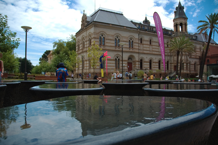 Water flowing over a sculpture in front of the South Australian Museum