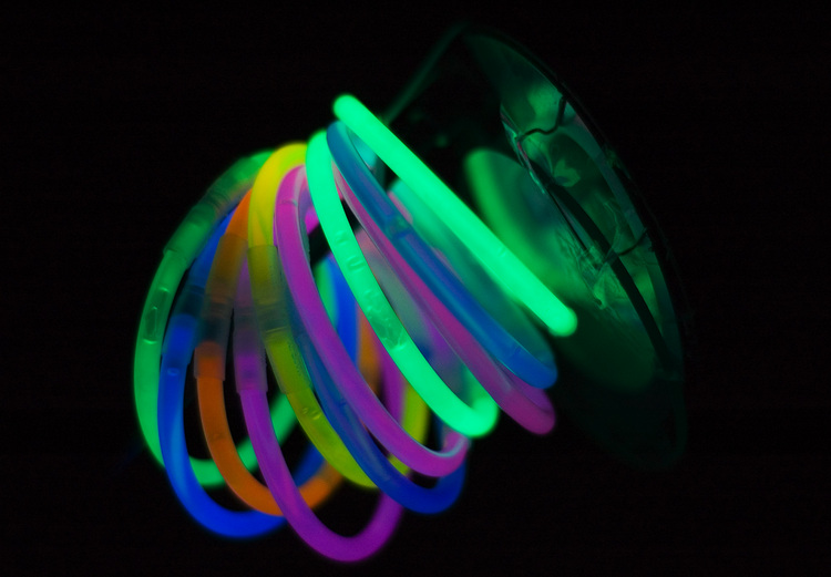 Glow-sticks, looped into circles