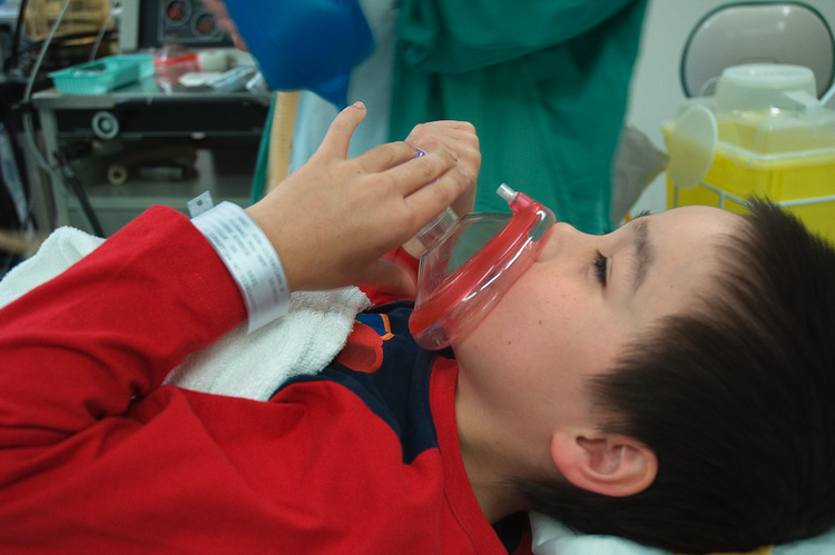 Michael breathing in anaesthetic prior to an operation