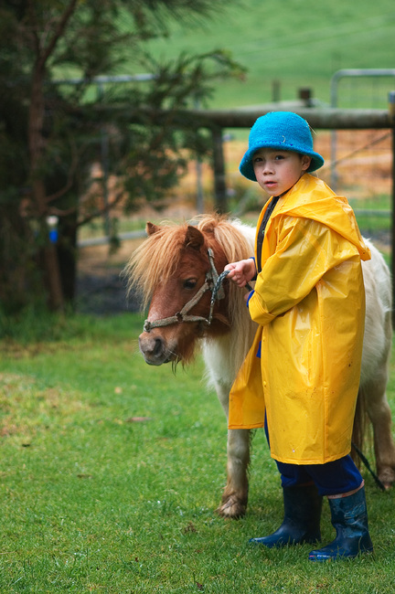 Michael leading a miniature horse