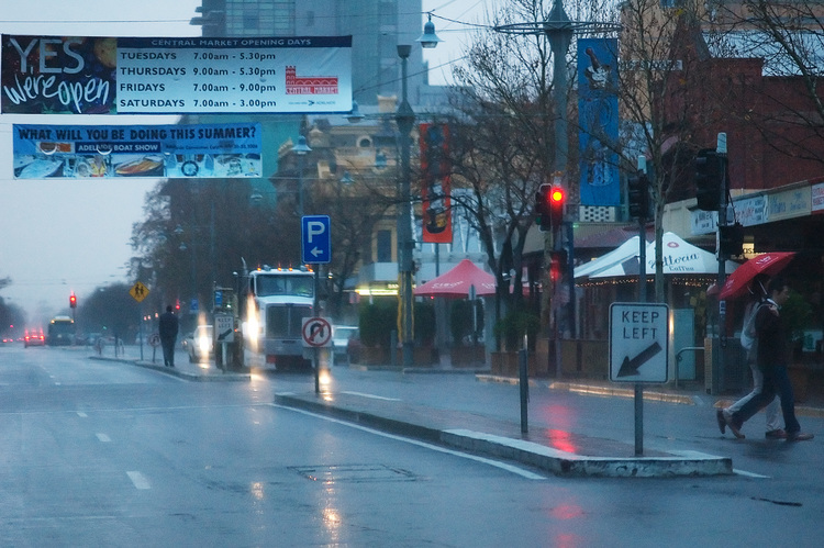 A wet dusk street scene in Gouger St, Adelaide