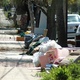 Street lined with other people's rubbish