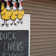 Sign reading 'Duck Livers'
