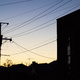 Buildings silhouetted against a dusk sky