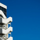 Building edge against blue sky