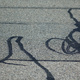 Squiggles of tar on a road surface