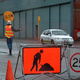 A roadworker and his signs