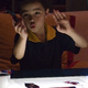 Michael lit from below as he plays at a light-table