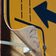 A bent road sign