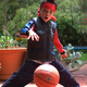 Michael bouncing a basketball