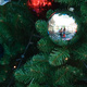 Closeup of Christmas baubles on a tree