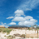 Sand dunes, and clouds in a bright blue sky